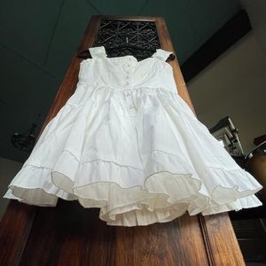 Short white dress w shorts inside. Small. Cute buttons.